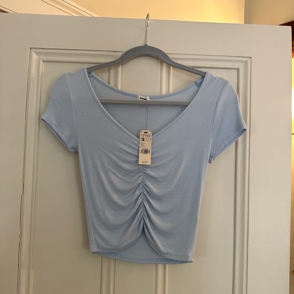 Brand new blue tee